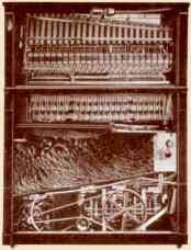 Catalogue illustration of a Link 2-E cabinet style piano, with mandolin attachement and xylophone.